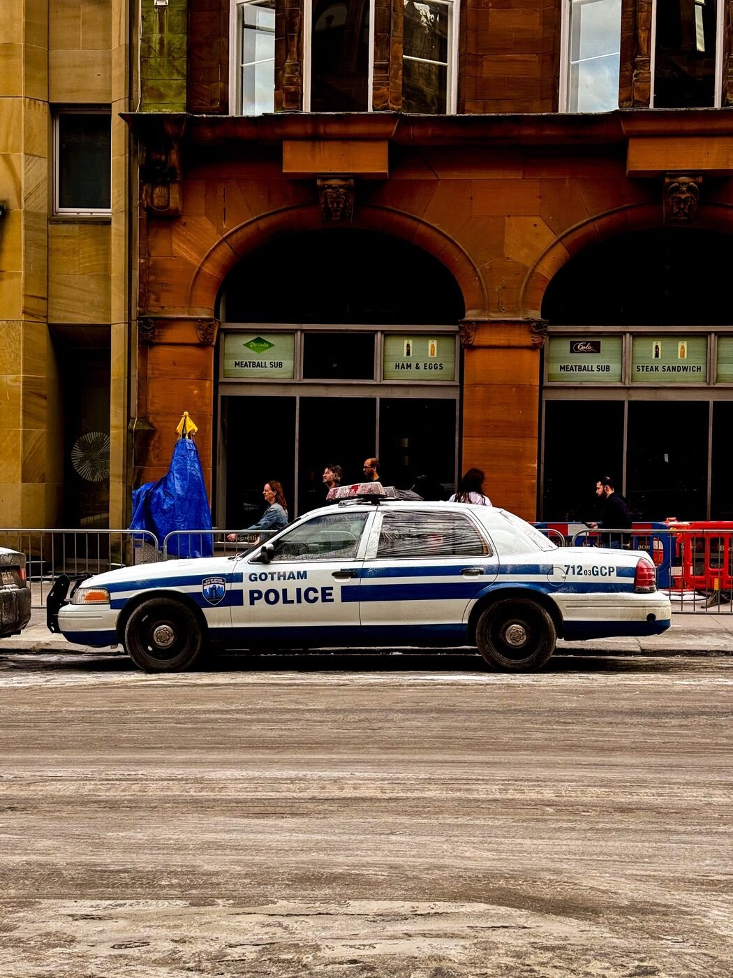 Gotham City Police car parked outside a sandstone building in Glasgow city centre